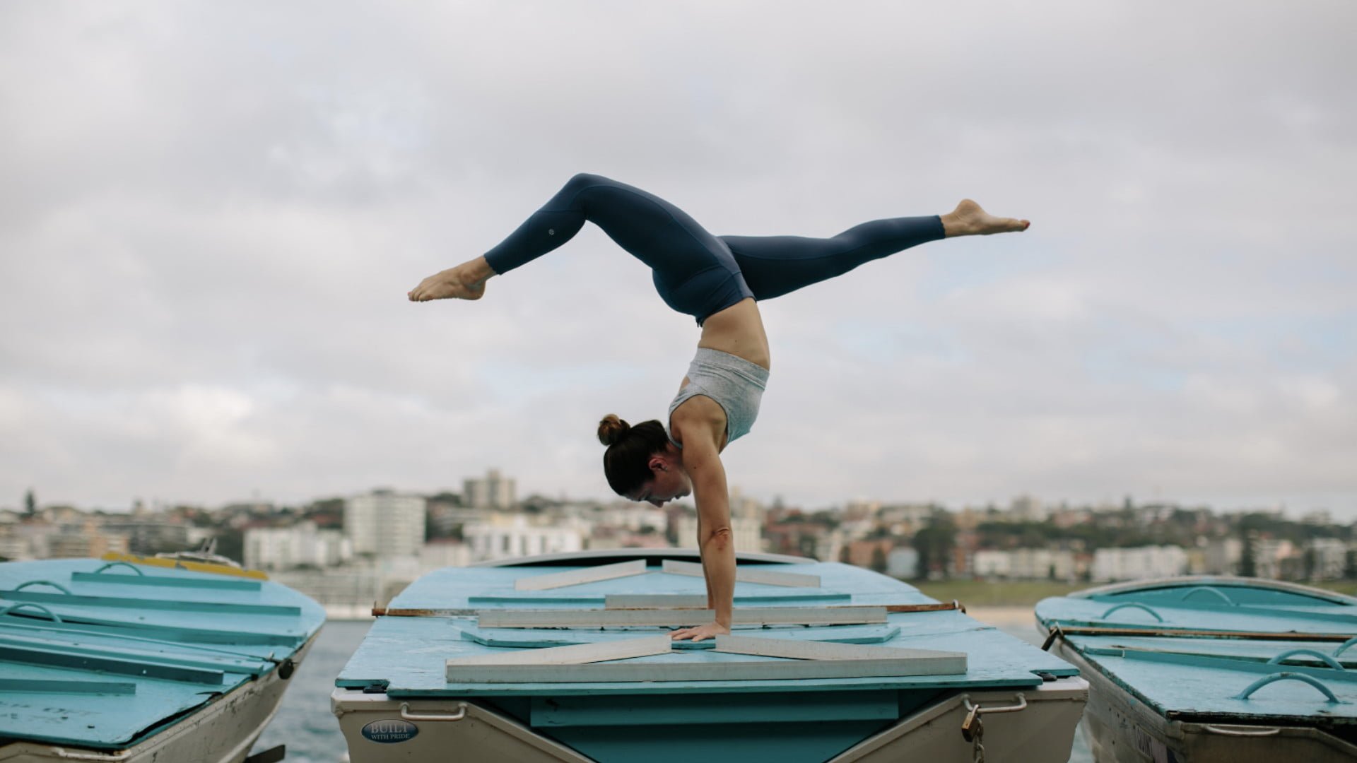 Kat Clayton Handstand Boat in Bondi