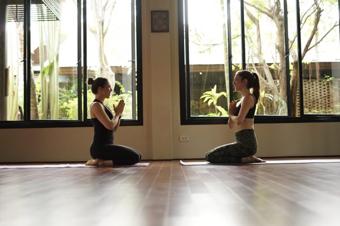 Kat Clayton yoga mentorship with yoga student in Thailand at retreat centre on a yoga retreat