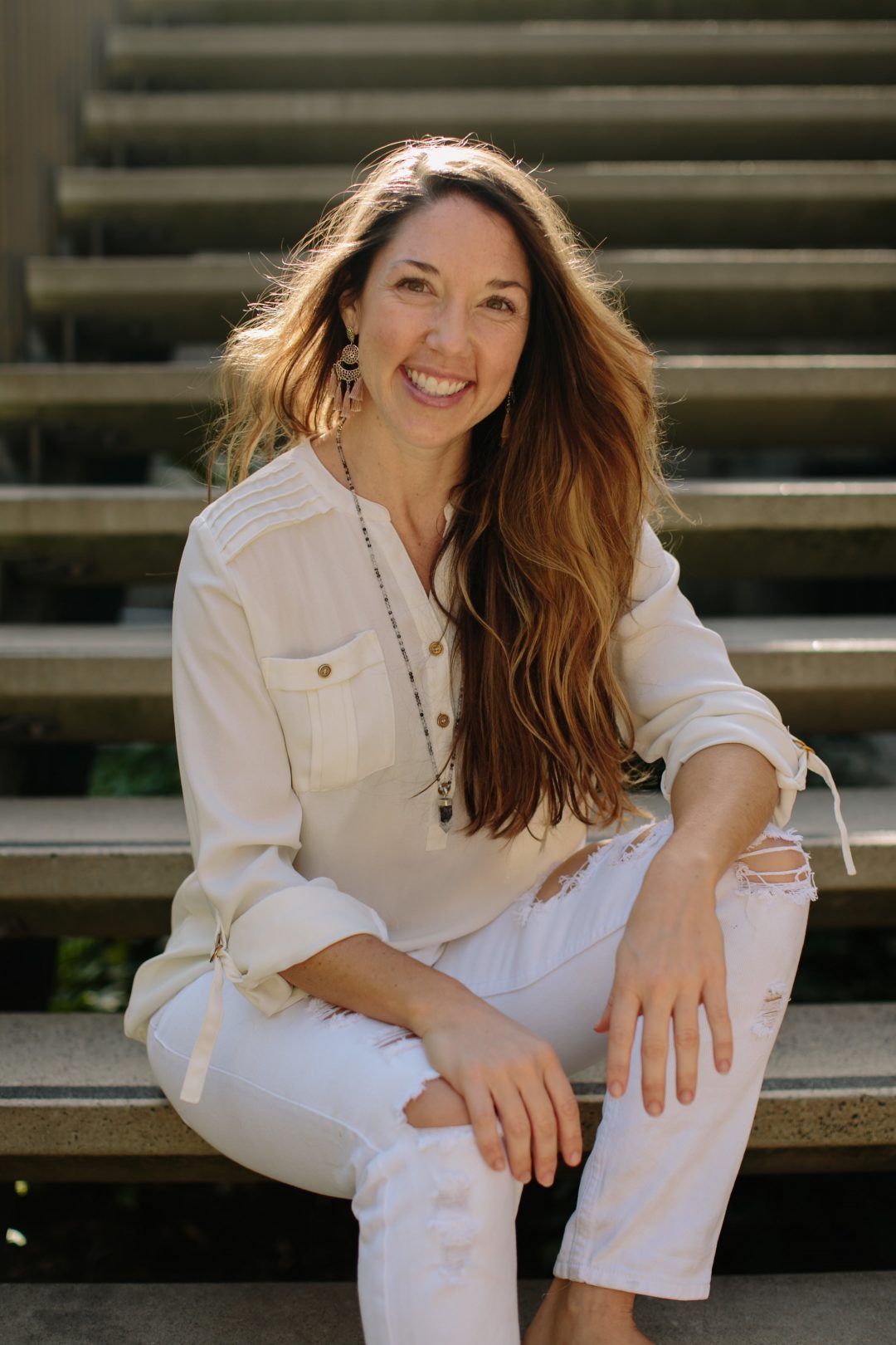 Kat Clayton yoga teacher and founder of Yoga Beyond Borders. Leads wellness yoga and meditation retreats and trainings globally.